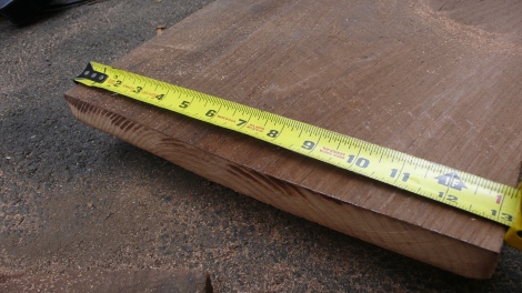 1 inch by 13 oak! I had five of these and the rest were yellow pine